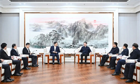 许昆林会见中国建材集团董事长周育先